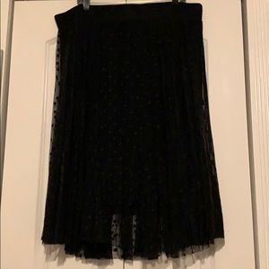 Black skirt with polka dot lace